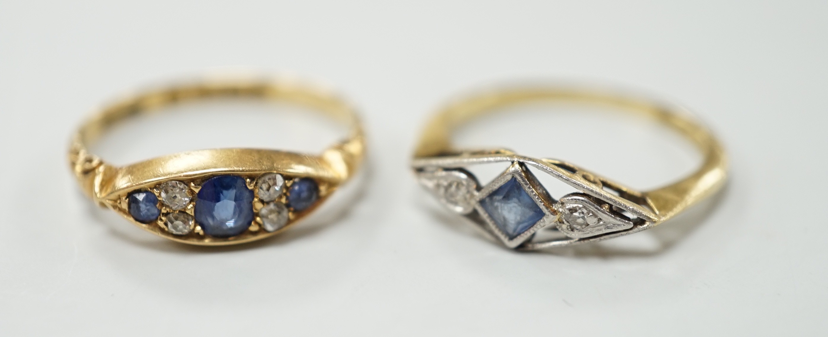 Two early 20th century 18ct, sapphire and diamond set rings, including Edwardian seven stone, size L and K/L